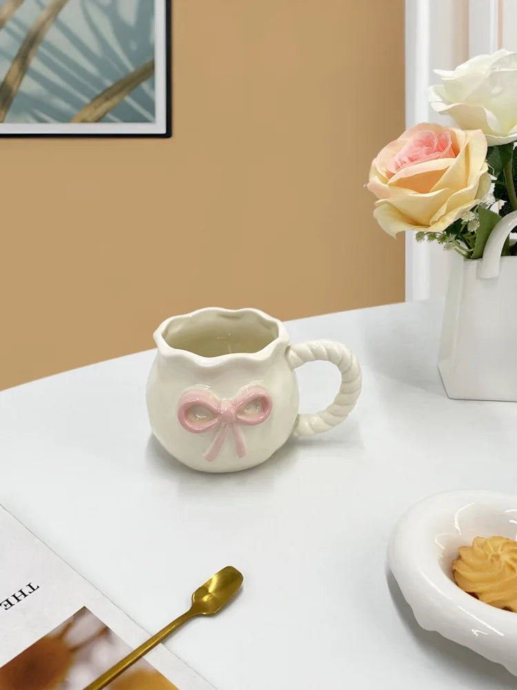 Elegant Bowknot Mug – Twisted Handle Ceramic Cup