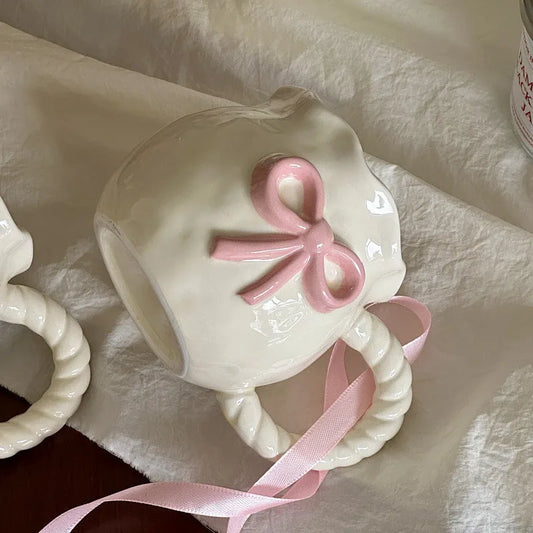 Elegant Bowknot Mug – Twisted Handle Ceramic Cup